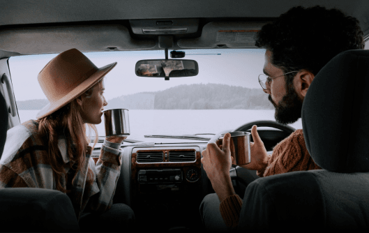 inside rental car happy with cashback